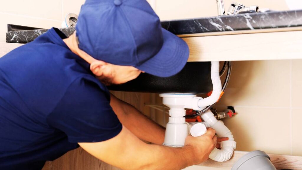 Plumber at work